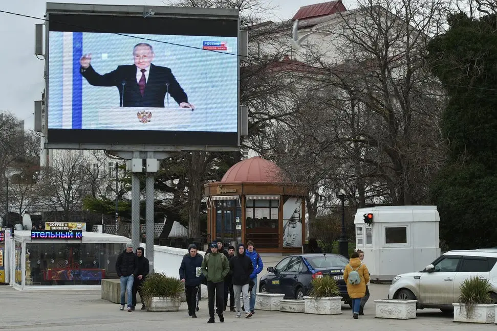 8101ad06-59b9-440a-8727-a300b235233d-Putin_2