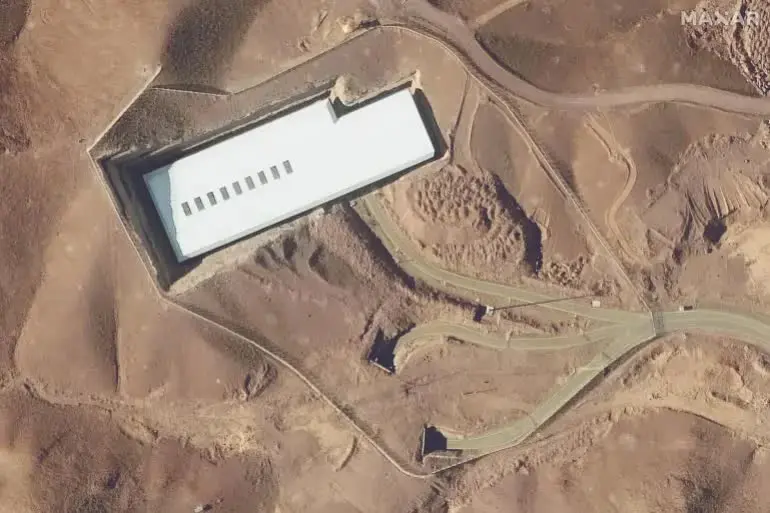 AFP__20250613__62872KD__v2__HighRes__IranIsraelNuclearFacilityFordow-1750302961